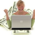 women on laptop making money